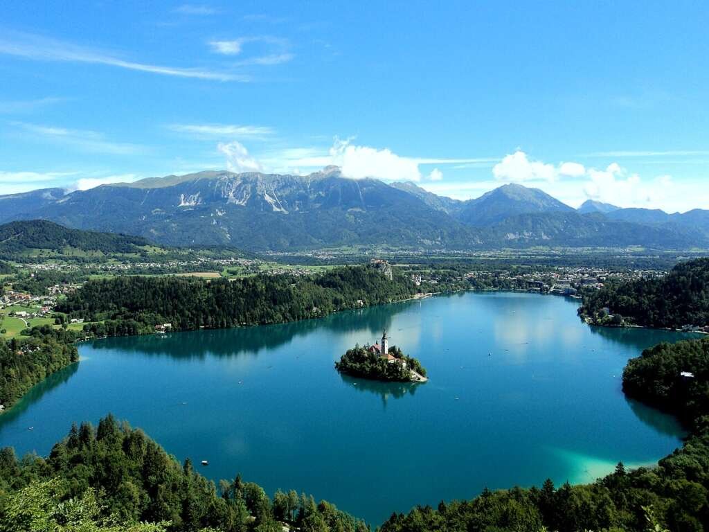 Lake Bled island church and cliffside castle, Slovenia