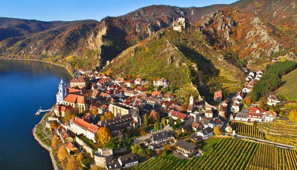 A fortified riverside village known for its cobbled lanes